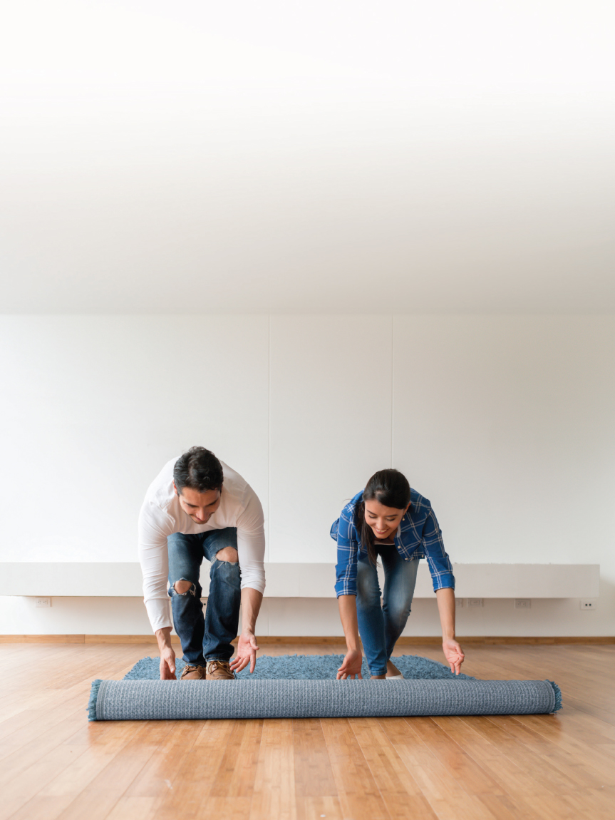 Mom and daughter playing with tablet on hard surface floors